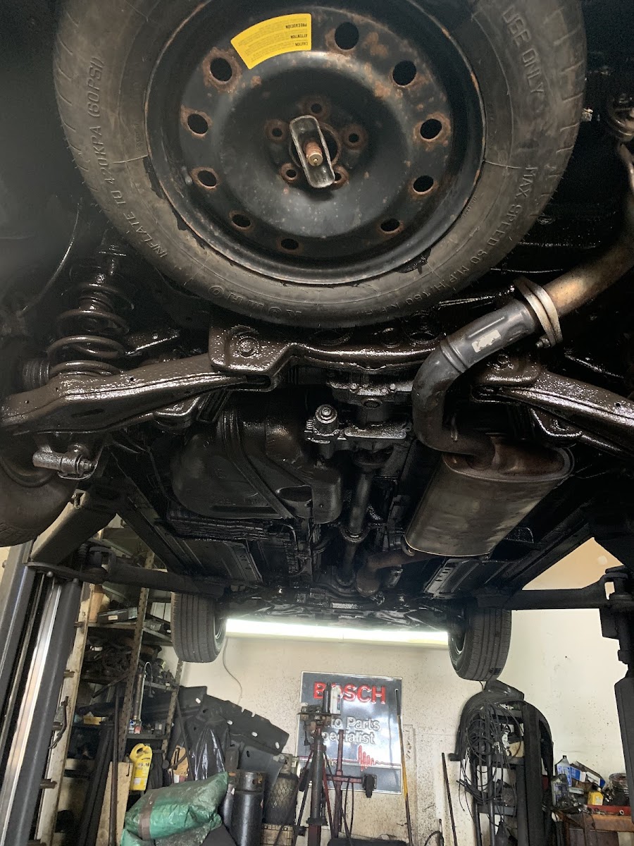 Vehicle undercoating in progress at MDB Auto